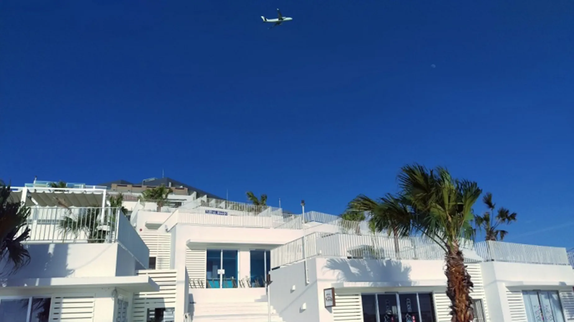 plane flying over senagajima